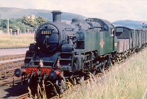 82020 in plain green livery, Towyn