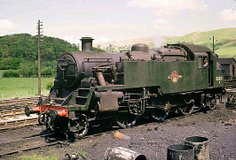 82021 is seen in unlined green livery against a lovely backdrop.