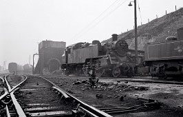 An atmospheric shot, on a very gloomy day, of 82020 and the tender of an Ivatt Class 2 mogul.